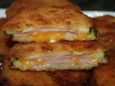 Calabacín relleno de quesos y york