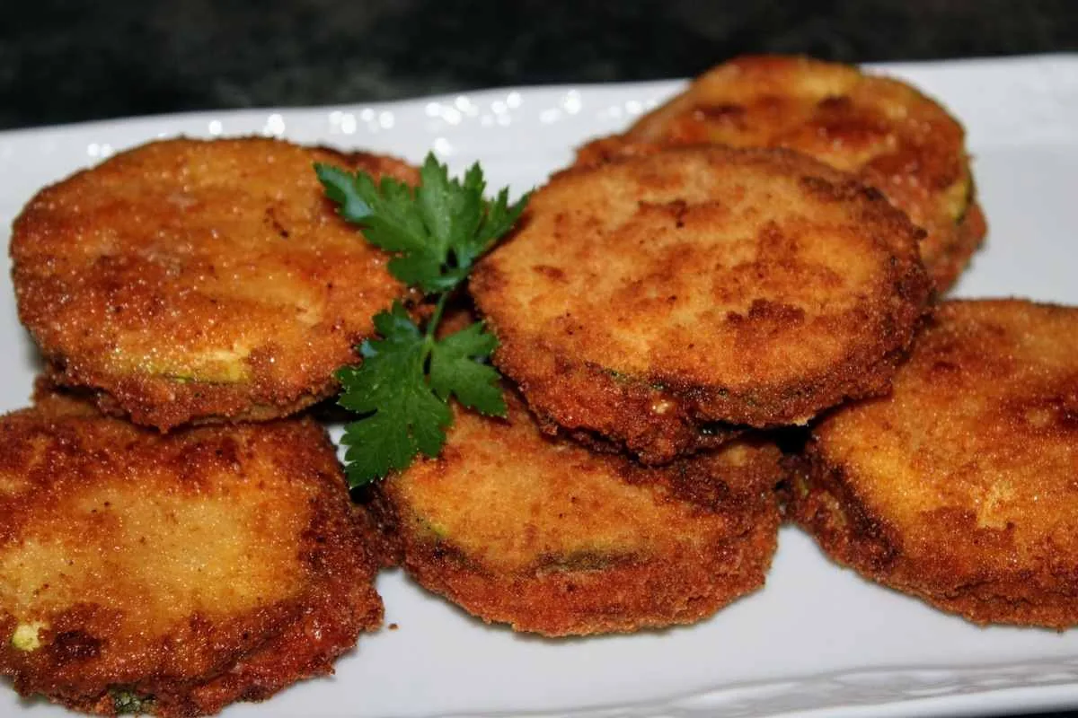 Calabacín relleno de quesos y york