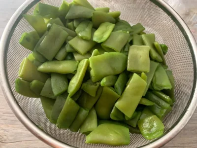 Guisantes con judías verdes y jamón