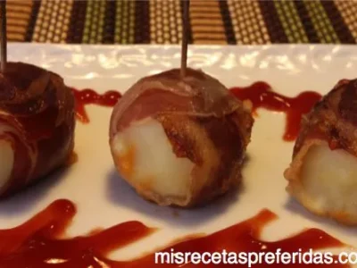 Bolitas de patata rellenas de paté envueltas con crujiente jamón ibérico