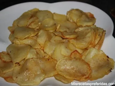 Verduras con coñac y queso con base de patatas
