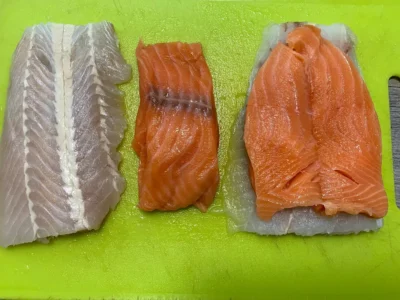 Merluza con salmón y patatas al horno