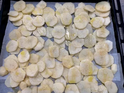Merluza con salmón y patatas al horno