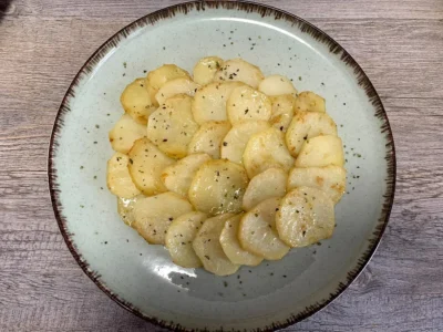 Merluza con salmón y patatas al horno