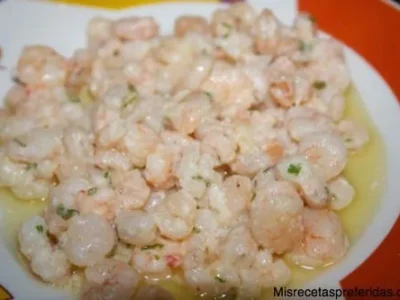 Raviolis de boletus edulis acompañados con crema de espinacas y gambas